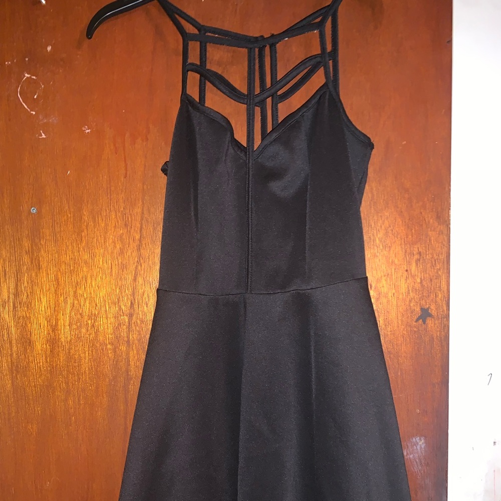 simple black dress with webber neck line